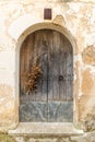 Arch shaped old wooden door