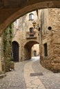 arch and street of the old town of medieval village of Pals, Girona province, Catalonia, Royalty Free Stock Photo