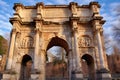 arch of titus in rome on a sunny day