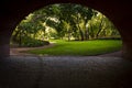 Arch under the bridge to the park Royalty Free Stock Photo