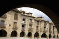 Arch view of Plaza Mayor, in Ainsa, Huesca, Spain in Pyrenees Mountains, an old walled town with hilltop views of Cinca and Ara Ri Royalty Free Stock Photo