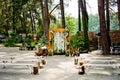 Arch for the wedding ceremony in a rustic style.