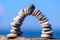 Arch of white pebbles Royalty Free Stock Photo