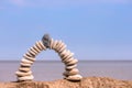 Arch of white pebbles Royalty Free Stock Photo
