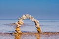 Arch of white pebbles Royalty Free Stock Photo