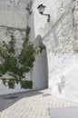 Arch in white town alley