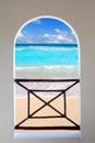 Arch window tropical Caribbean beach seen through