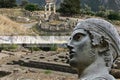 Archaeological artifact found at Delphi in the background of the temple of Apollo and the temple of Athena