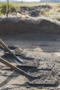 Archaeological dig, with shovels removed thin layer of the earth Royalty Free Stock Photo