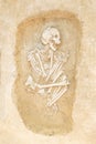 Archaeological excavations man and finds bones of a skeleton in a human burial, a detail of ancient research, prehistory Royalty Free Stock Photo