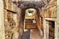 Archaeological excavations of Ostia Antica:Inside a ruin with arch and paved road