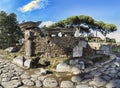 Archaeological excavations of Ostia Antica, the ruins of the Porta Romana and the cobblestones of the Decumanus Maximus