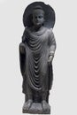 Archaeological sculpture standing of Buddha in meditation from Indian mythology Royalty Free Stock Photo