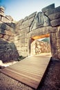 The archaeological site of Mycenae near the village of Mykines, with ancient tombs, giant walls and the famous lions gate.