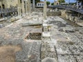 Archaeological site. Rows of antique columns and mosaic floor.