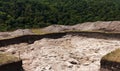 Archaeological work, archaeologists dug a hole in field to search for historical artifacts