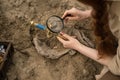 Archaeologist excavates and searches for treasure