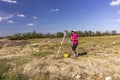 Archaeologist excavating near an old fortress