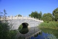 Archaize stone bridge in the park Royalty Free Stock Photo