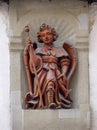 Archangel Raphael statue on the building facade in Lucerne