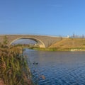 Arched bridge over the calm water of Oquirrh Lake Royalty Free Stock Photo