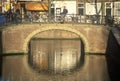 Arched Bridge Over A Canal, Amsterdam, Holland