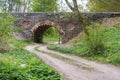 Arched bridge over a country road, arched passage under the railway Royalty Free Stock Photo