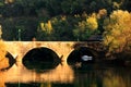 Arched bridge reflected in Crnojevica river, Montenegro Royalty Free Stock Photo