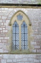 An arched church window Royalty Free Stock Photo