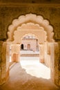 Arched corridor of the historic Orchha Fort in India, with its intricate architecture Royalty Free Stock Photo