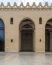 Arched corridor surrounding the courtyard of Al Hakim Mosque - The Enlightened Mosque - Cairo, Egypt Royalty Free Stock Photo