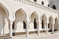 Arched corridor in white mosque