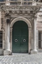 Arched door with Doric columns