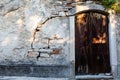 Arched Door in Old Weathered House in Pula