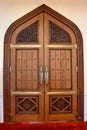 Arched Doorway with carvings and metalwork Royalty Free Stock Photo