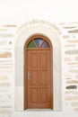 Arched doorway of the local church of Marpissa village at Paros island.