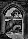 Arched doorway to lakeside patio Royalty Free Stock Photo