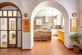 arched doorways of a spanish home with terracotta accents