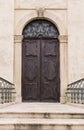 Arched entrance of a medieval palace.