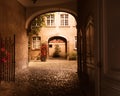 Arched entrance to courtyard on old European building Royalty Free Stock Photo