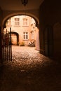 Arched entrance to courtyard on old European building Royalty Free Stock Photo