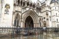 Arched entrance to the Royal Courts of Justice on Strand, London, United Kingdom Royalty Free Stock Photo