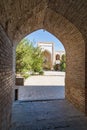 Arched entranceway to a courtyard at the Kukaldosh Madrasa in Bukhara