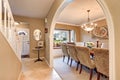 Arched entry to elegant Formal dining room