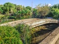 Arched footbridge over a stream in the Ataturk Kultur Park in Antalya, Turkey