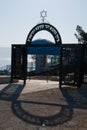 Arched gateway to the tomb of Rabbis Akiva and the Ramchal, Rabbi Moshe Chaim Luzzato. The Hebrew reads: Burial site of the
