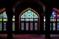 Arched interior with colourful tiles at Nasir al-Mulk pink mosque in Shiraz, Iran. Empty mosque with no people in the morning, Royalty Free Stock Photo