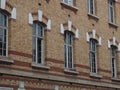 Arched lintels with white painted keystones and supporting abutme