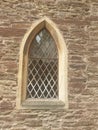 A arched medieval castle window Royalty Free Stock Photo