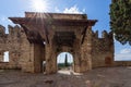 Arched medieval gate with drawbridges at the entrance to the castle of Brescia.